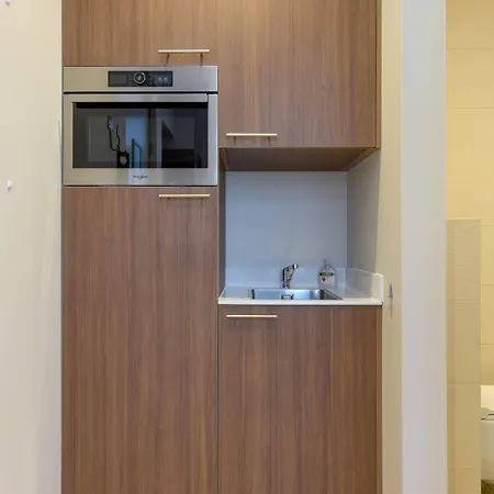 With Single Beds And Balcony *