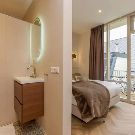 With Single Beds And Balcony